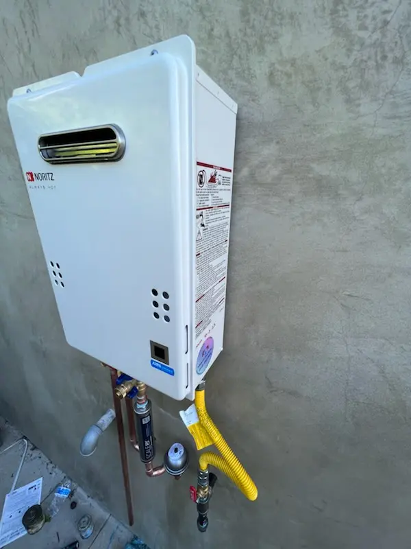 Tankless water heater installation for Remus homes